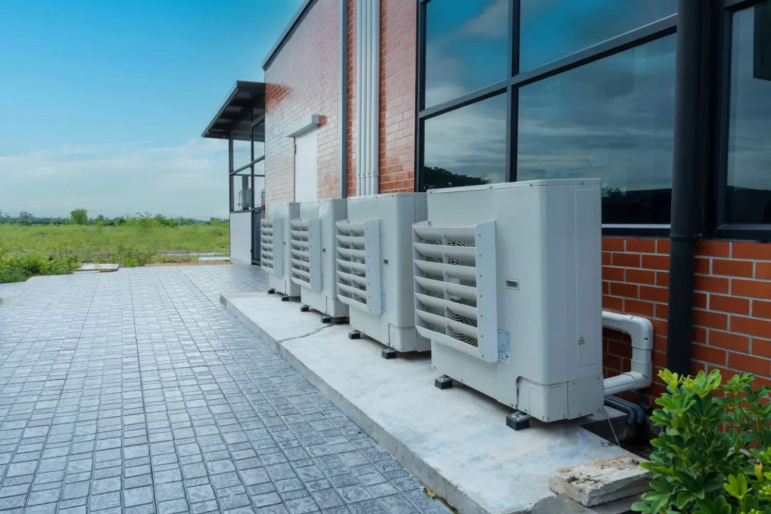 Accolade TECA-certified technician diagnosing a heat pump fault at a Surrey home
