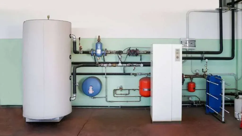 Property manager reviewing HVAC records with Accolade technician