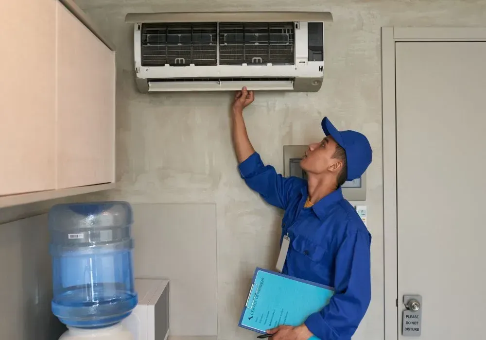 James from Accolade Heating explaining HVAC options to homeowner